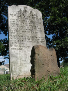 Grave of Peter Becker (1687-3/19/1758), first Brethren minister in US. Original headstone in front. Harley family burial grounds at Klein Meeting House. HEADSTONE INSCRIPTION: "In memory of PETER BECKER. First Eld. of the Brethern in America, Born at Dillsheim in Germany 1687, Embraced the Doctrine of the Brethern 1714. Emigrated with twenty families of Brethern and settled in Germantown 1719. Came to Indian Creek 1747 and died 3/19/1758. He was married to Dorothy Partman by whom he had two daughters, Mary married Rudolph Harley & Elizabeth Jacob Stump. Erected by his great great grandson May 17, 1886, Abrm. H. Cassel"
